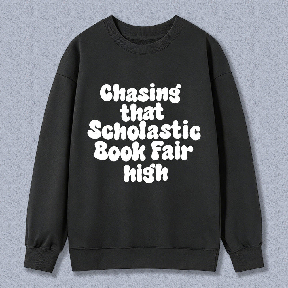 Wardrobecart Chasing That Scholastic Book Fair High Unisex Classic Sweatshirt
