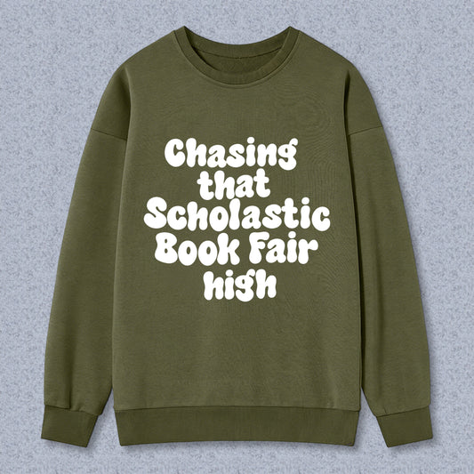 Wardrobecart Chasing That Scholastic Book Fair High Unisex Classic Sweatshirt