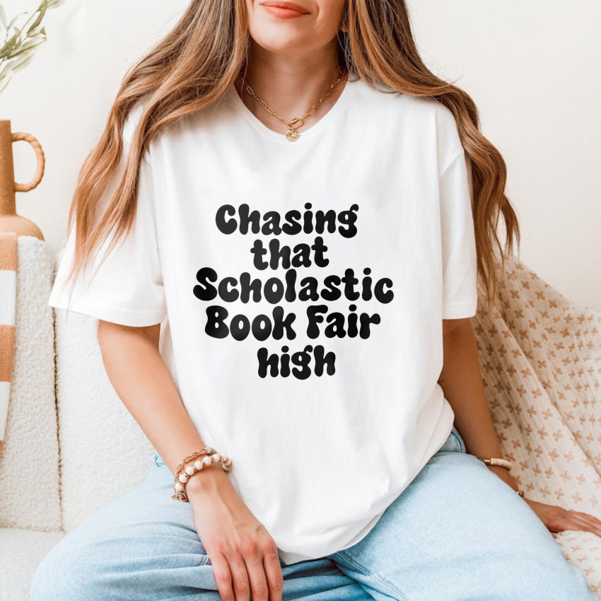 Wardrobecart Chasing That Scholastic Book Fair High Unisex Classic T-shirt