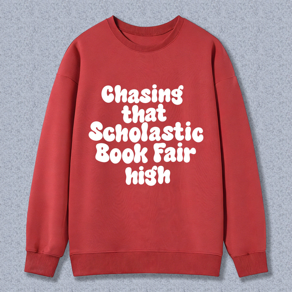 Wardrobecart Chasing That Scholastic Book Fair High Unisex Classic Sweatshirt