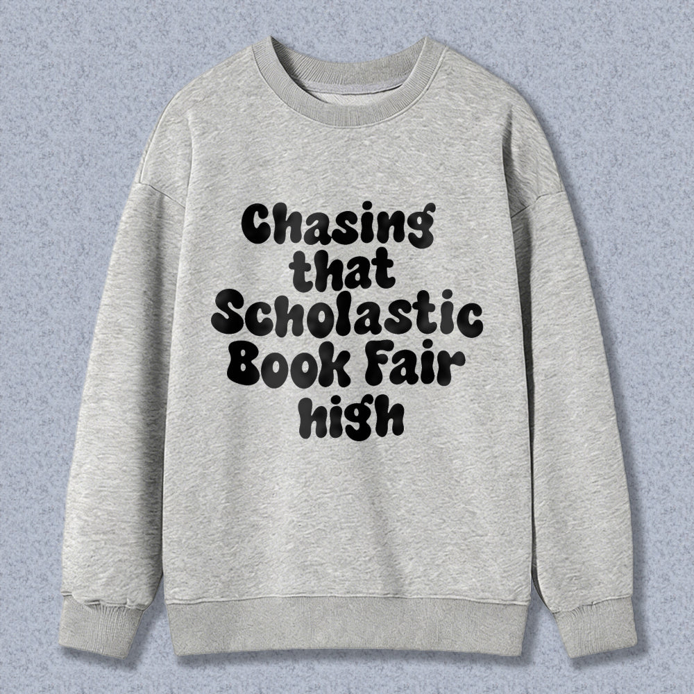 Wardrobecart Chasing That Scholastic Book Fair High Unisex Classic Sweatshirt