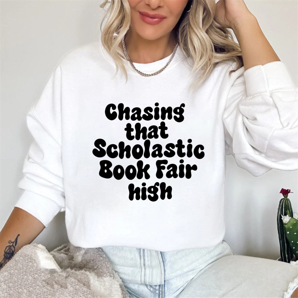 Wardrobecart Chasing That Scholastic Book Fair High Unisex Classic Sweatshirt